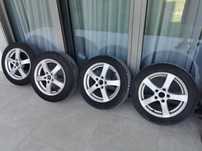 Jante auto Dezent 16" cu anvelope de iarna Continental