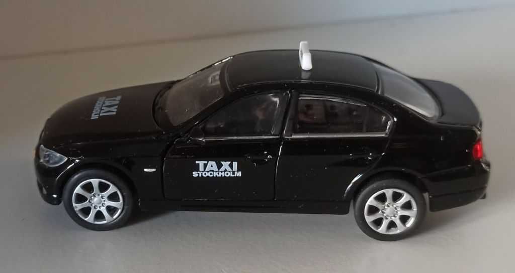 Macheta BMW 330i (E90) 2009 Taxi Stockolm - Welly 1/36