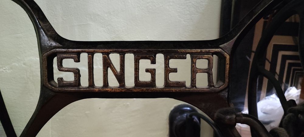 Крачна шевна машина Singer