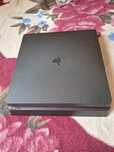 PS4 Slim 500 GB + Controller + Resident Evil Origins