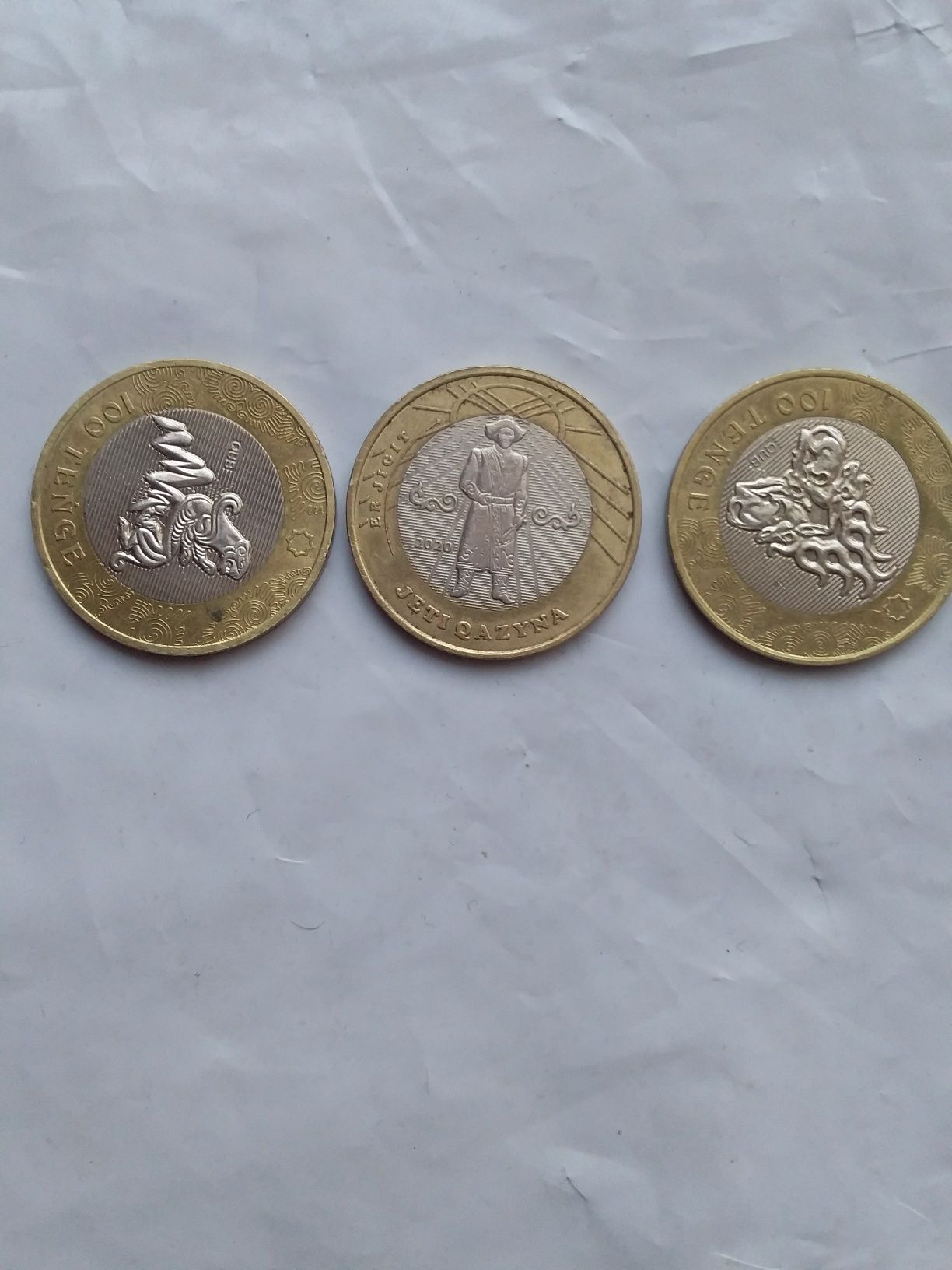 продам юбилейные три монеты.одна монета 10000 тенге
