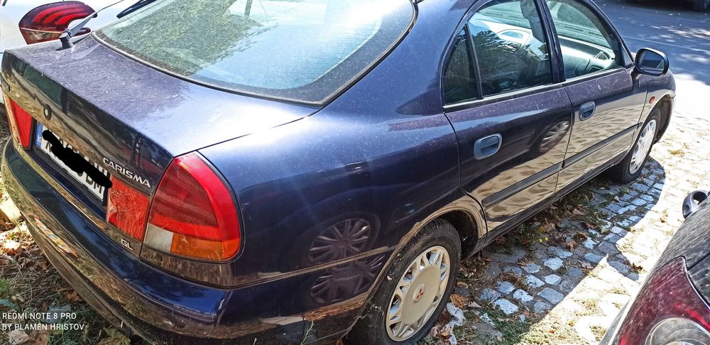 Митсубиши carisma бензин и дръжки за вратите.