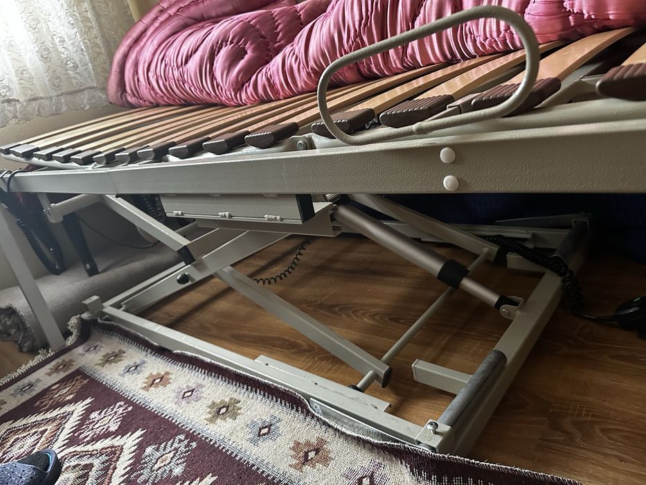 Pat electric cu telecomanda pt persoane cu dizabilitati.