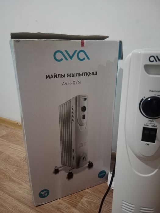 Обогреватель новый масленный