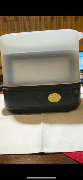 Стерилизатор и уред за затопляне на Томи Типи