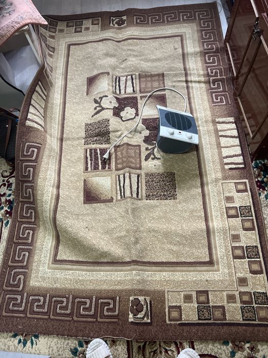 Ковер и обогреватель