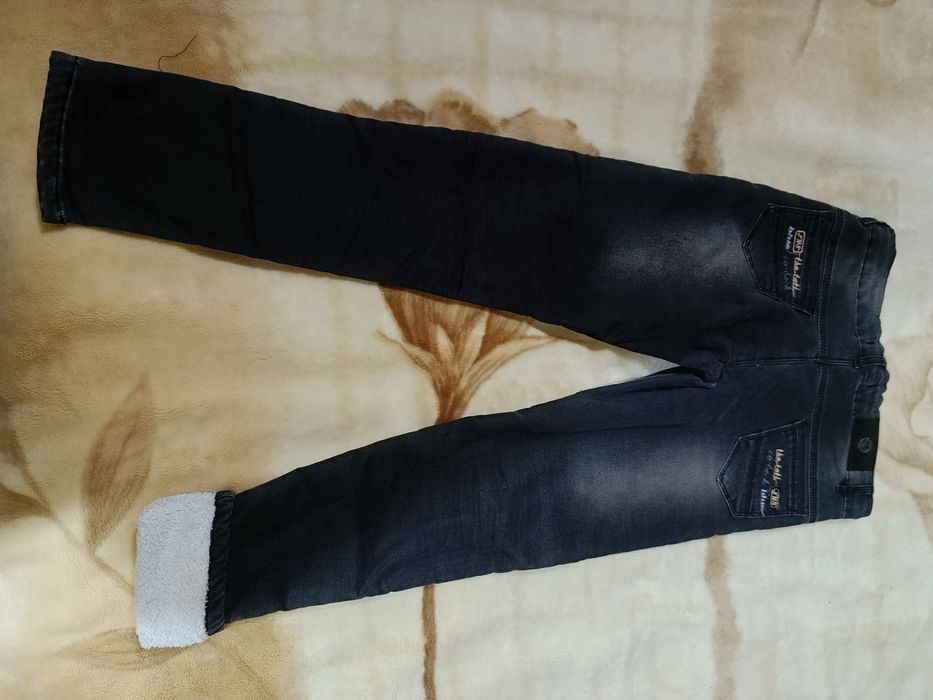 Джинсы с начесом на 10-12 лет.