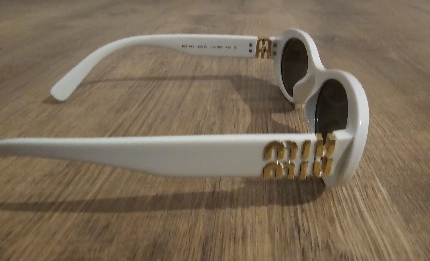 Сънчеви очила miu miu