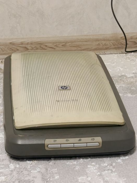 Отдам бесплатно старый сканер