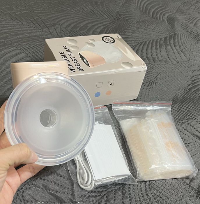 Молокоотсос электрический новый