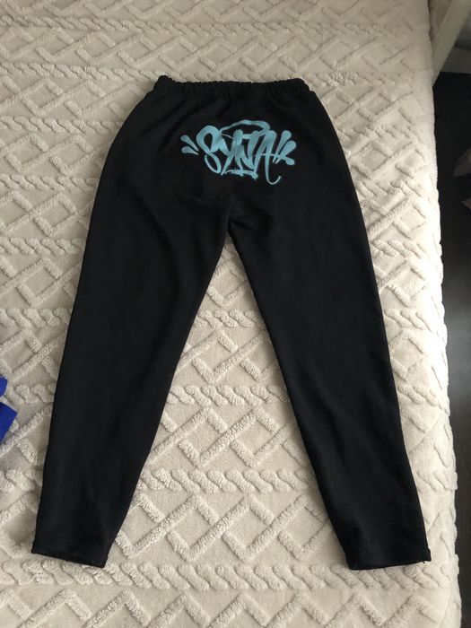 vand pantaloni syna world