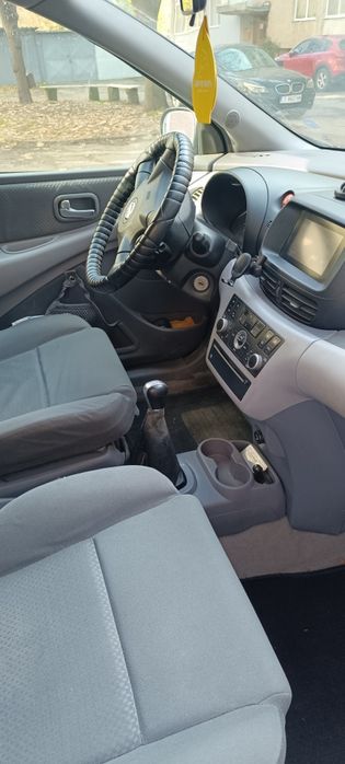 Автомобили Nissan Almera Tino