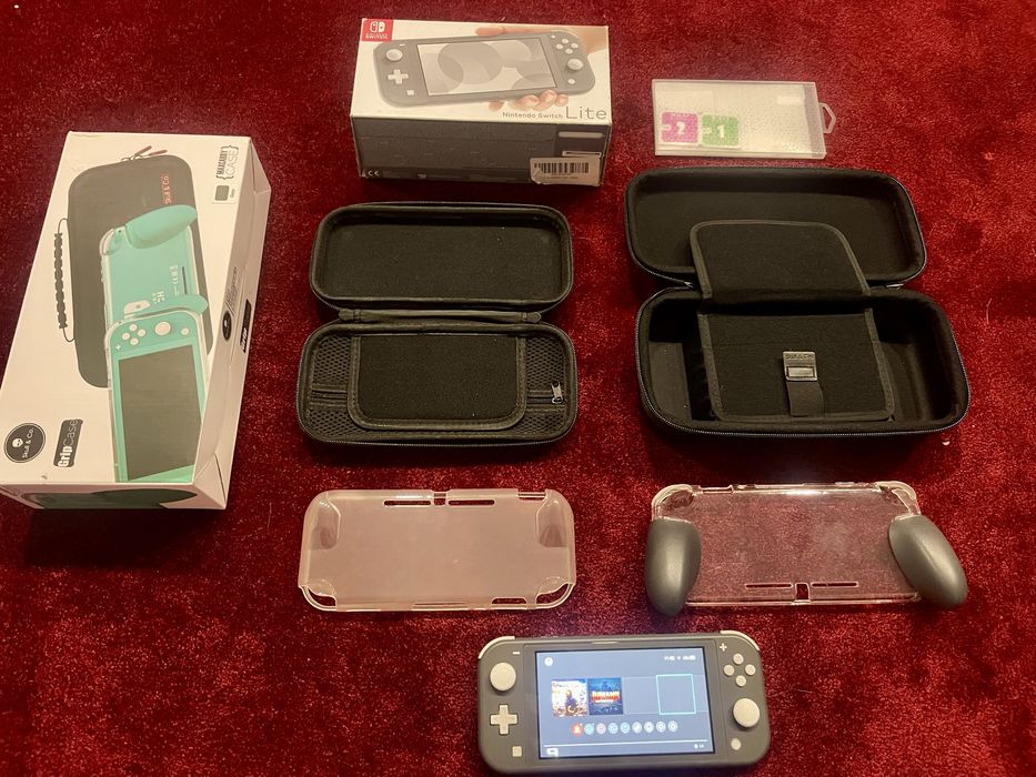 Nintendo Switch lite + accesorii impecabil