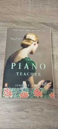 Piano teacher...