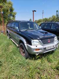 Dezmembrez Mitsubishi l200, motor 2.5 diesel, an 2003