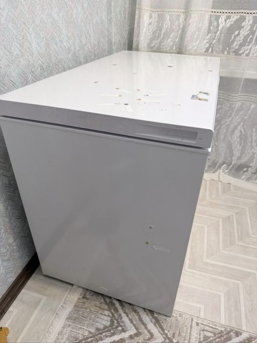 Морозильник в состоянии нового