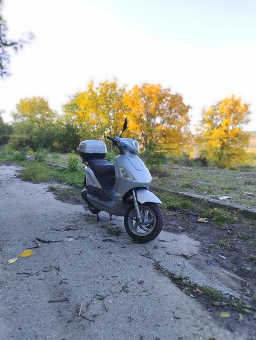 Скутер piaggio fly 125