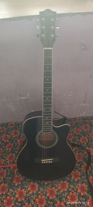 Gitara sotiladi.