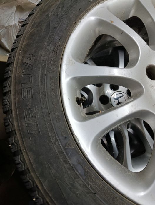 Продавам 4 зимни гуми с джанти за Хонда