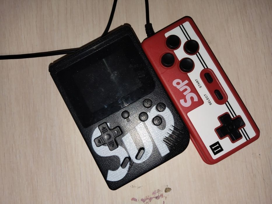 Продам мини-приставку с джойстиком и зарядкой