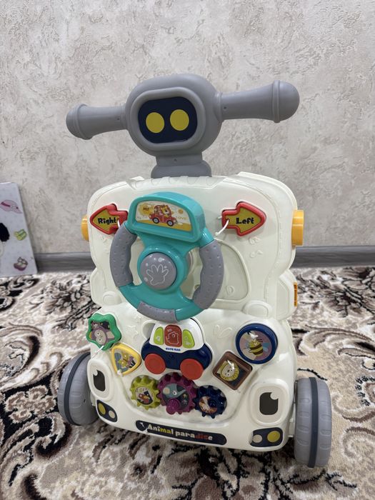 Детская каталка ходунок