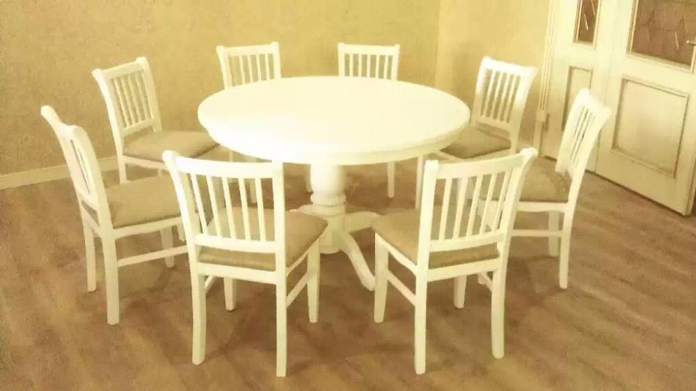 Круглый стол + 6 стульев из натурального дерева по приемлемой цене .