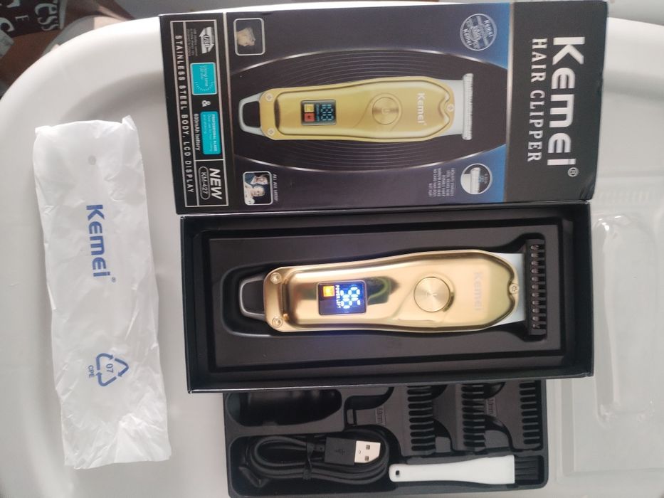 Masina de tuns Kemei