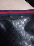 Gucci man bag...