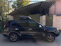 Машина Nisan X-Trail