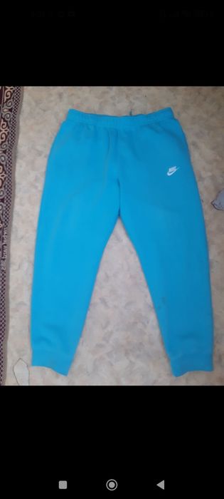 Продам оригинальные спортивные штаны Nike, голубого цвета