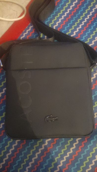 Барсетка лакост новенкая не разу не ипсользовал