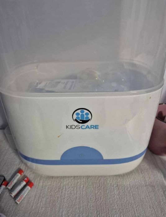 sterilizator electric pentru biberoane, marca KidsCare.
