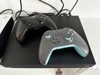 Xbox one X 1 TB + 2 controllere + 8 jocuri