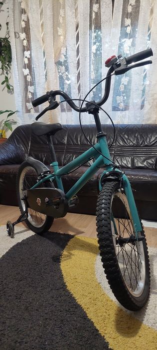 Bicicleta cu roti ajutatoare