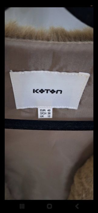 Vesta blana artificiala Koton