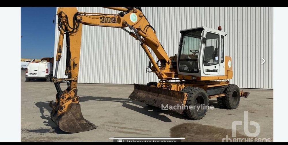 Excavator Liebherr pe roți