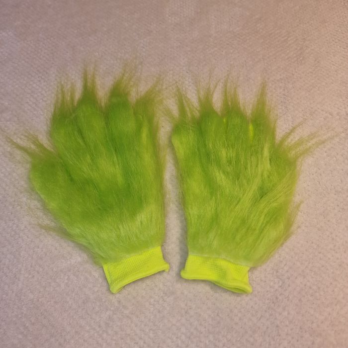 Manusi Grinch imblanite