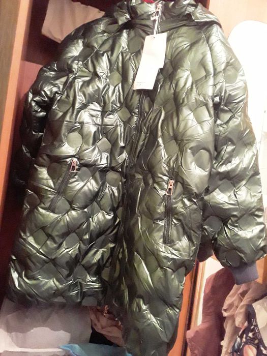 Новая куртка на 12лет.