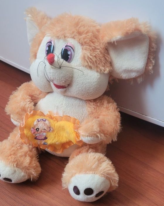 Pluş portocaliu cu inimioara