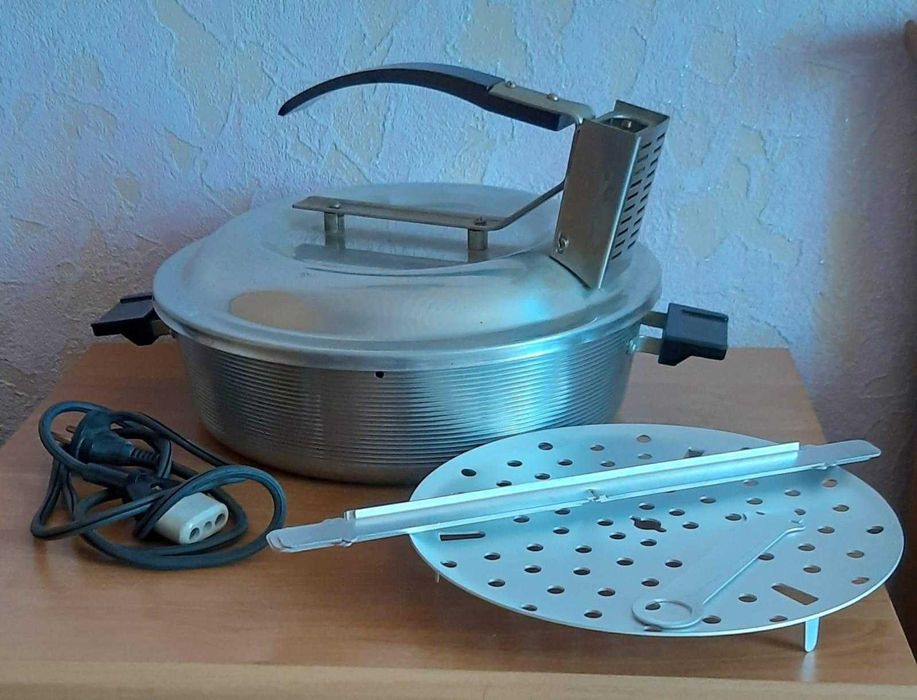 Продам электрическую  чудо печь