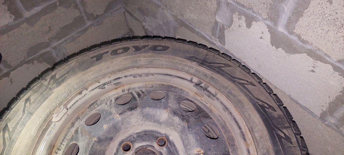 Шины шипованные на железных дисках R15