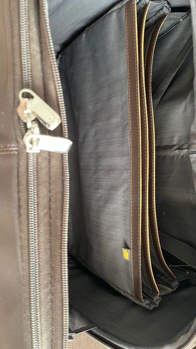 Малък кожен куфар на колелца Samsonite