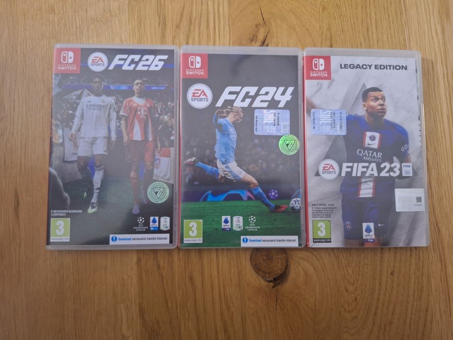 Nintendo Switch OLED+3 jocuri FIFA +Accesorii-Stare impecabilă