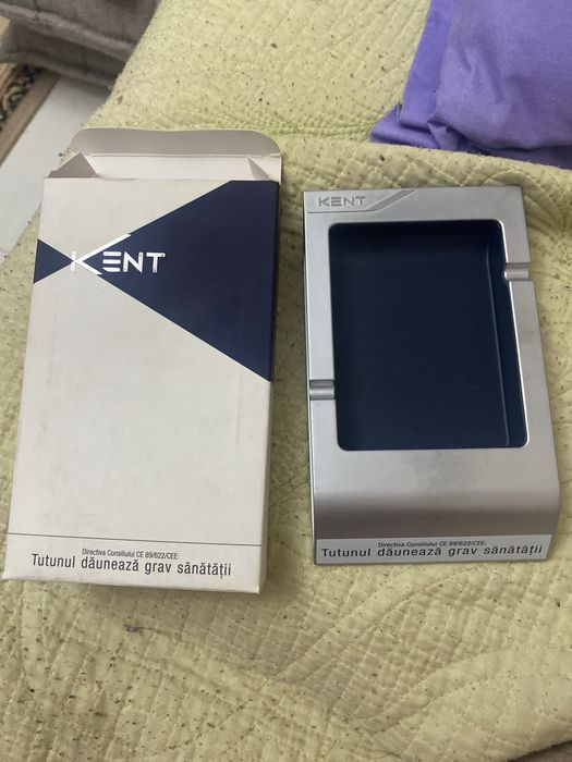 Scrumiera kent noua.