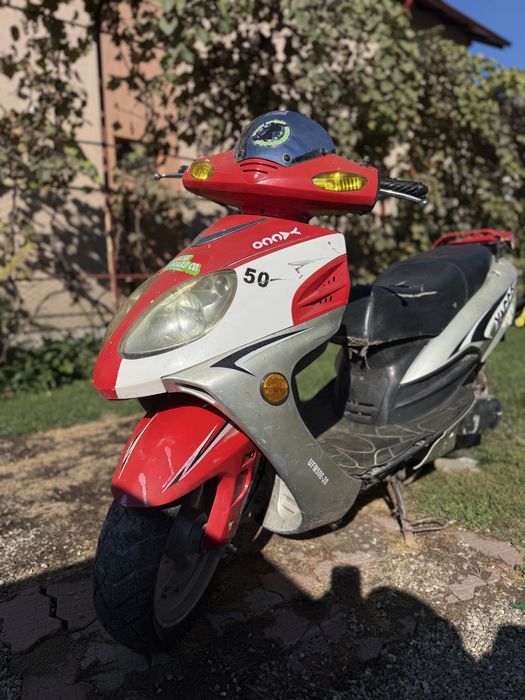Scuter 4t,49cc vand sau schimb cu telefon