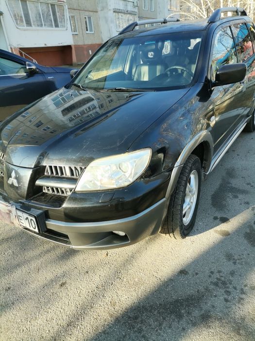 Мицубиси аутлендер 2005 год выпуска
