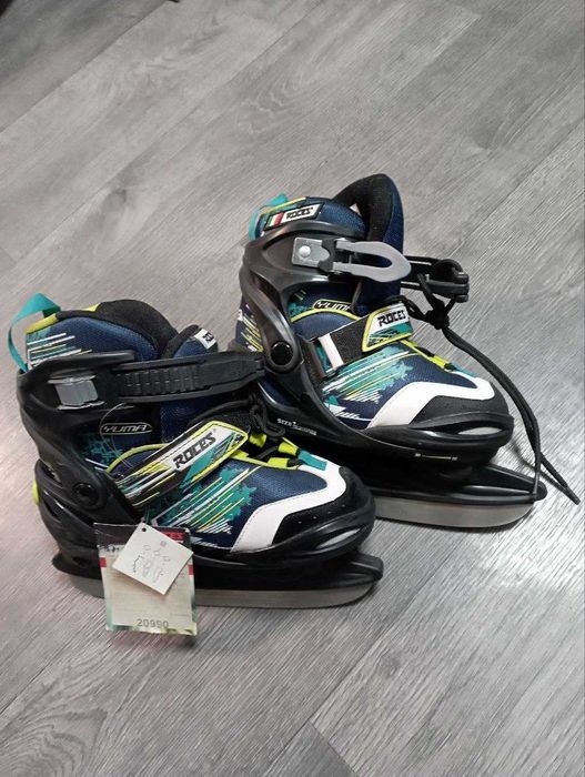 Коньки регулирующиеся детские. С 30 по 35 размер ноги.