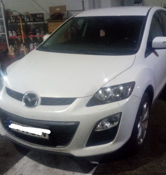 Vând mazda cx7 cu motorul  defect