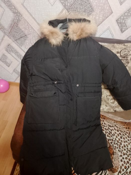 Продам пуховик 48 размер
