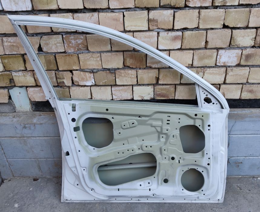 Lacetti oldi chap eshik